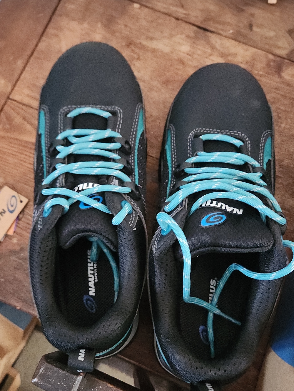 Nautilus Black Shoes with Teal Accents